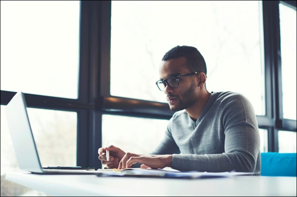 Man working at his computer