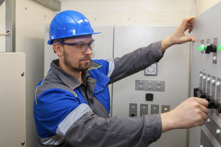 technician working on an electrical panel