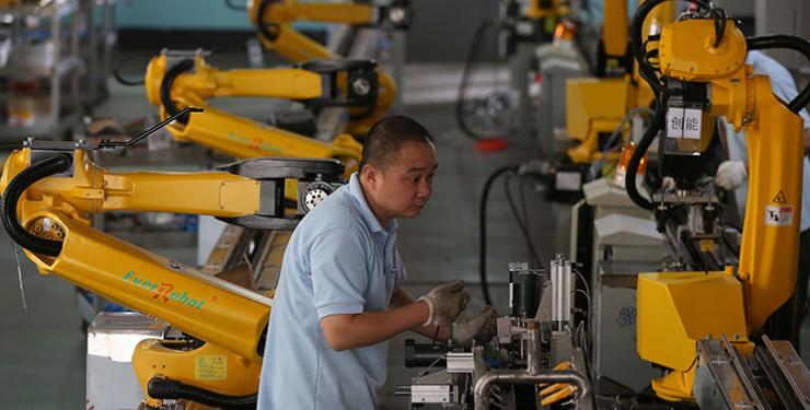 man working on robot